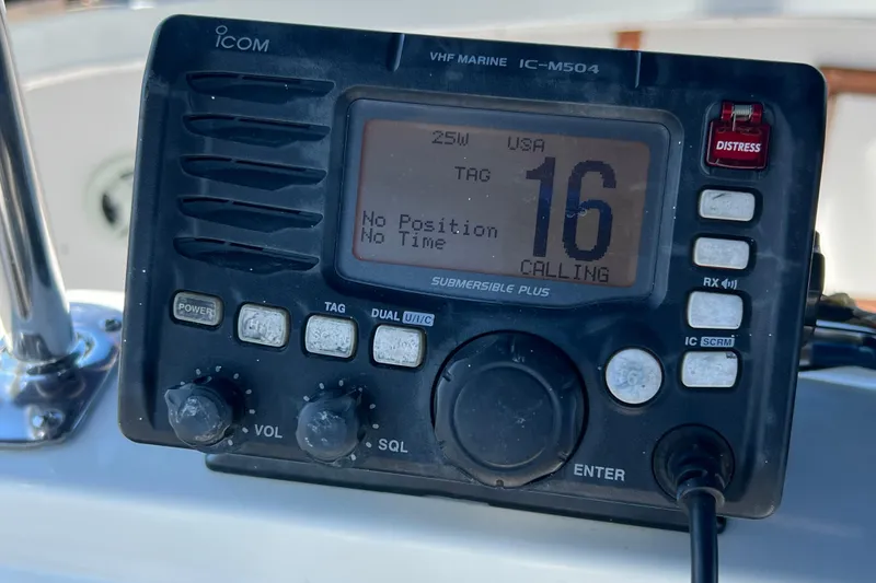 Slide: The Image of VHF marine radio on 1987 Carver 4227 Cockpit Motor Yacht, channel 16 calling. - 93