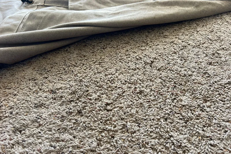 Slide: The Image of Gray fabric on textured carpet, related to Carver 4227 Cockpit Motor Yacht, 1987. - 96