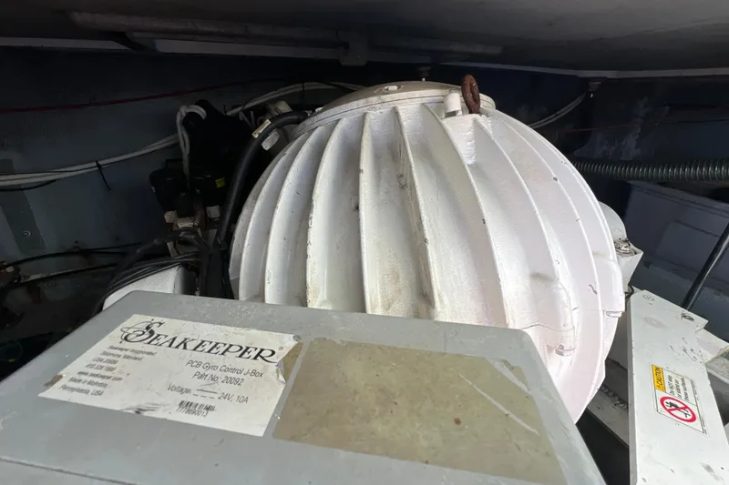 Slide: The Image of Seakeeper gyro stabilizer in 1987 Carver 4227 Cockpit Motor Yacht engine room. - 98