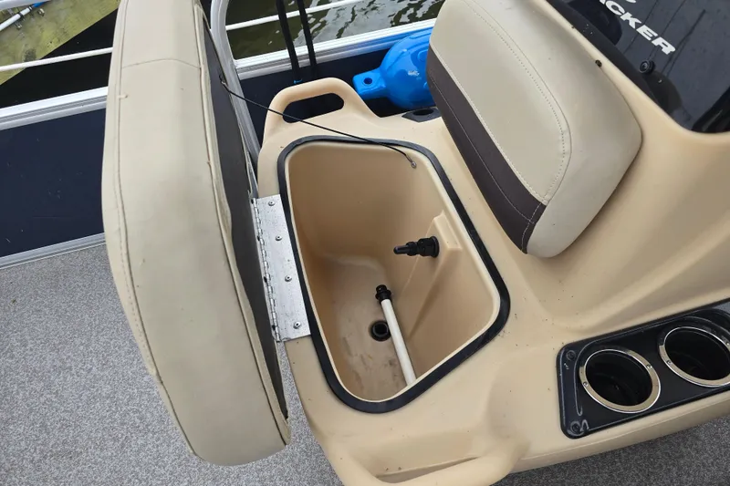 Slide: The Image of 2019 TRACKER MARINE Bass Buggy boat seat storage compartment with cup holders. - 11
