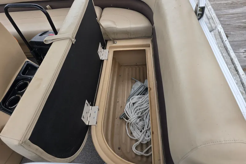 Slide: The Image of 2019 TRACKER MARINE Bass Buggy storage compartment with rope and anchor. - 14