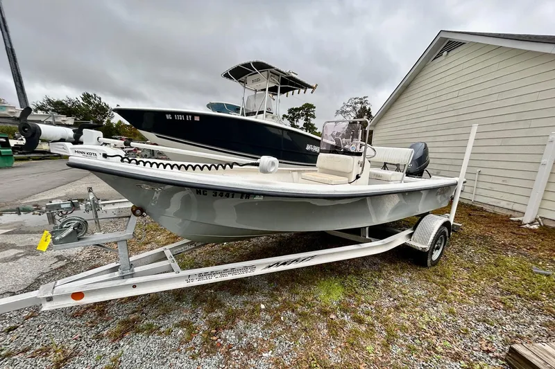 Slide: The Image of 2021 May-Craft 1700CC boat on trailer, parked outdoors, overcast sky. - 3