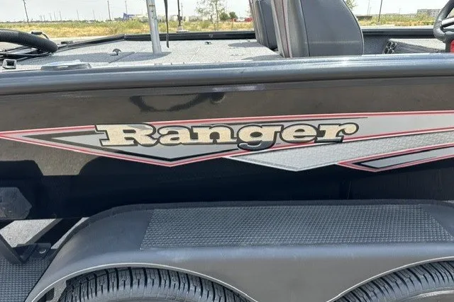 Slide: The Image of 2025 Ranger ALPHA 208 boat with logo and sleek design details. - 1