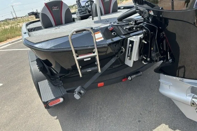 Slide: The Image of 2025 Ranger ALPHA 208 boat rear view with ladder and motor details. - 7