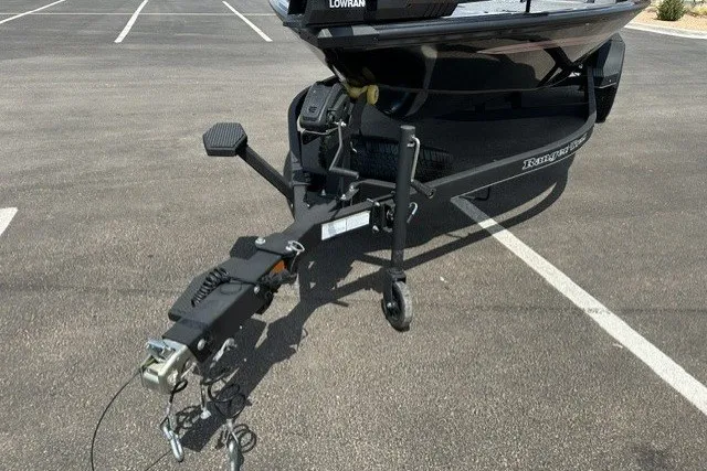 Slide: The Image of Trailer hitch of a 2025 Ranger ALPHA 208 boat in a parking lot. - 10