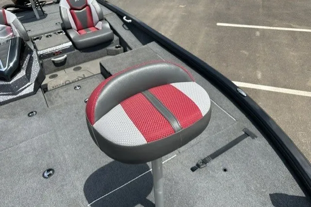 Slide: The Image of 2025 Ranger ALPHA 208 boat interior with red and gray seating. - 13