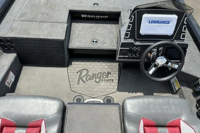 Slide: The Image of 2025 Ranger ALPHA 208 boat interior with steering wheel and Lowrance display. - 17