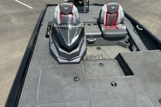 Slide: The Image of 2025 Ranger ALPHA 208 boat interior with dual seats and sleek dashboard design. - 14