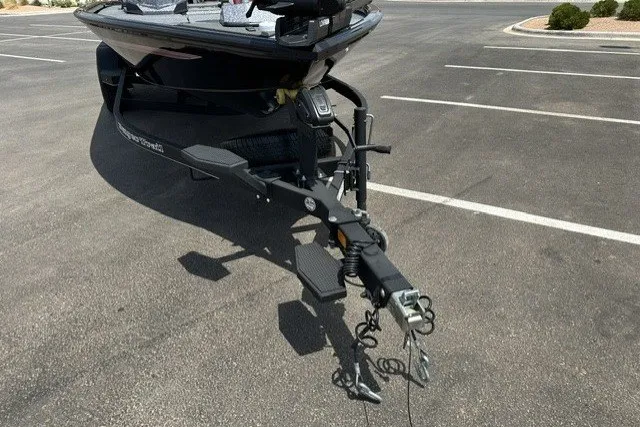 Slide: The Image of Trailer hitch of a 2025 Ranger ALPHA 208 boat in a parking lot. - 9
