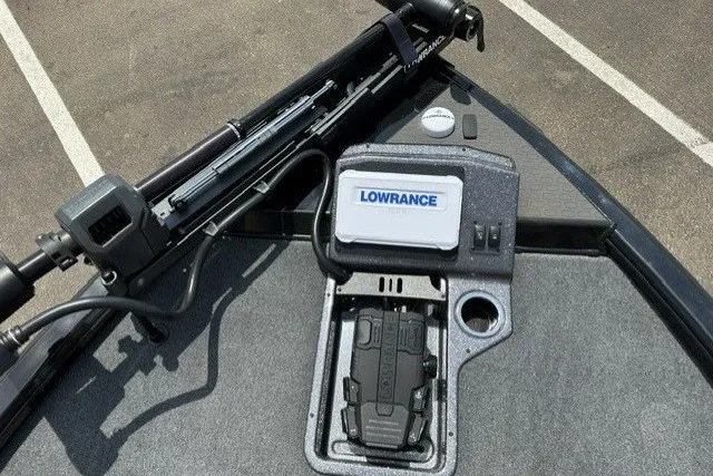 Slide: The Image of The image shows the deck of a Ranger ALPHA 208 boat with a Lowrance fish finder. - 11