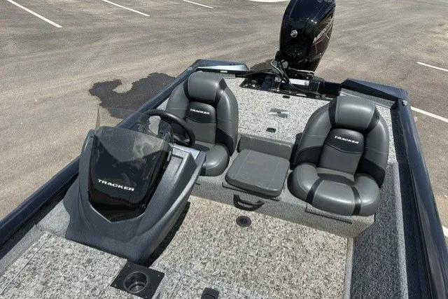 Slide: The Image of 2026 Tracker Pro Team 175 boat interior with dual seats and steering console. - 15