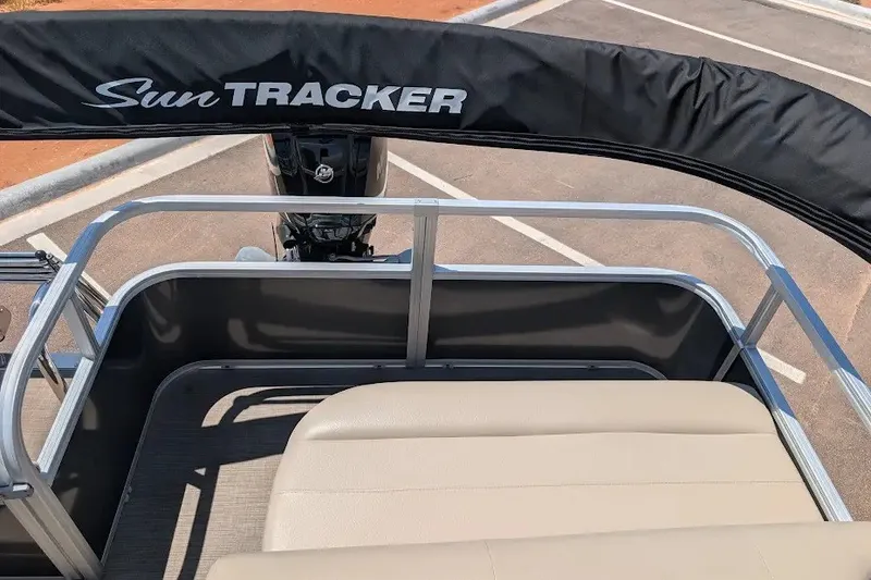 Slide: The Image of 2024 Sun Tracker Party Barge 18 DLX pontoon boat with seating and canopy. - 13