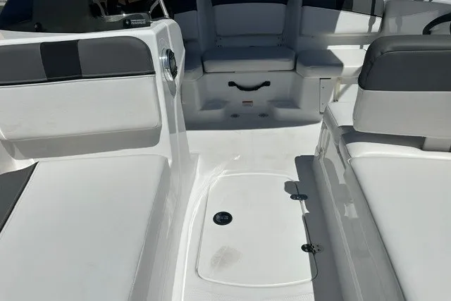 Slide: The Image of Interior view of a 2025 Tahoe T16 boat, featuring white seating and sleek design. - 13