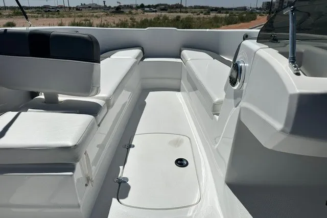 Slide: The Image of 2025 Tahoe T16 boat interior with white seating and sleek design. - 12