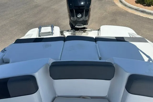 Slide: The Image of 2025 Tahoe T16 boat with sleek seating and powerful outboard motor. - 17