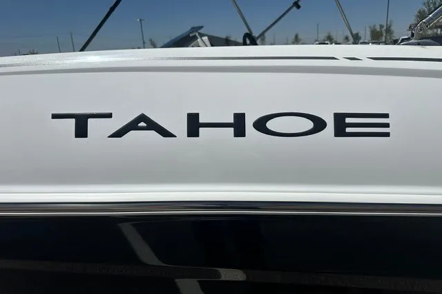 Slide: The Image of 2025 Tahoe T16 boat logo on white surface under clear sky. - 1