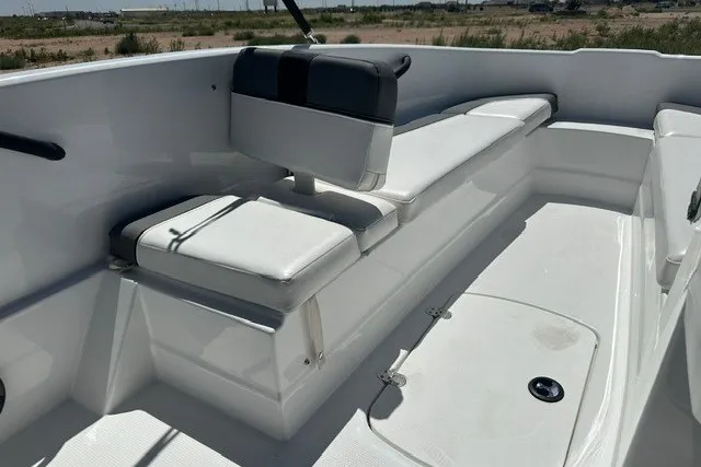 Slide: The Image of 2025 Tahoe T16 boat interior with white seating and sleek design. - 14