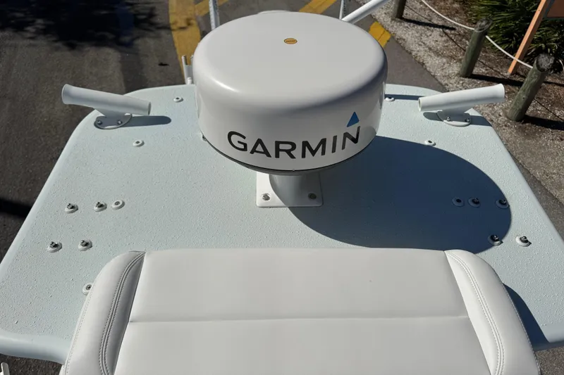 Slide: The Image of 2017 Yellowfin 24 Bay CE boat with Garmin radar system on deck. - 17