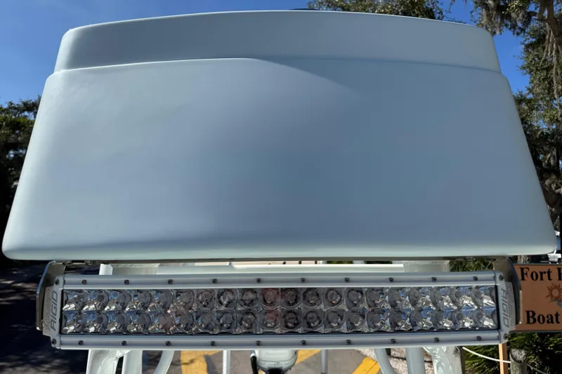 Slide: The Image of 2017 Yellowfin 24 Bay CE boat with LED light bar, outdoor setting. - 21