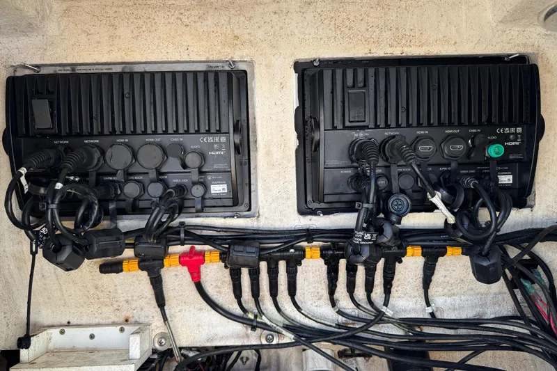 Slide: The Image of Electrical panel with wiring in a 2017 Yellowfin 24 Bay CE boat. - 24