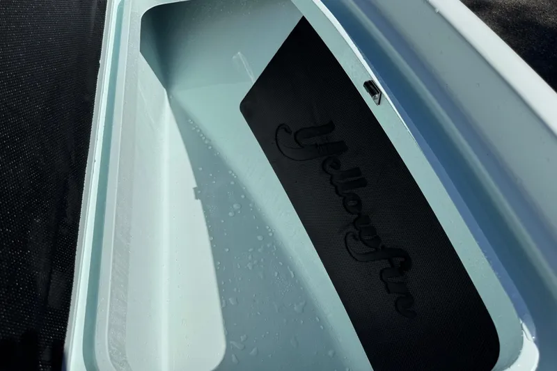 Slide: The Image of 2017 Yellowfin 24 Bay CE boat interior with logo detail. - 33