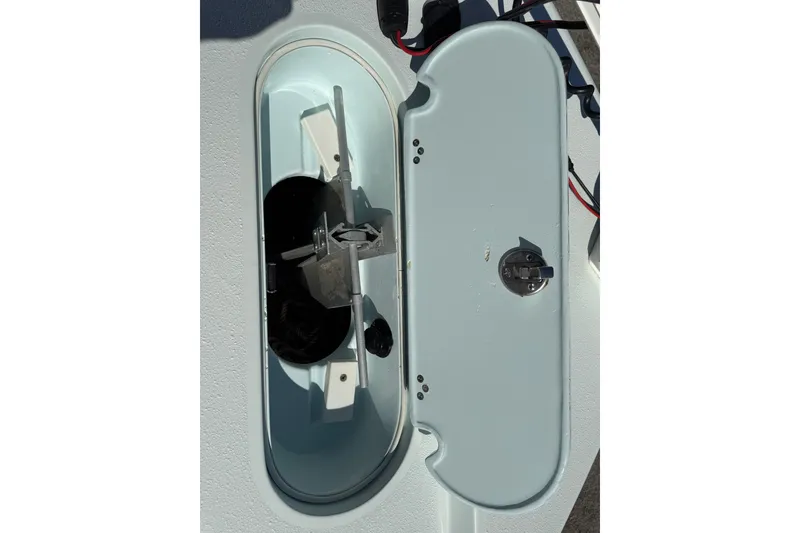 Slide: The Image of 2017 Yellowfin 24 Bay CE boat anchor compartment with open hatch. - 39