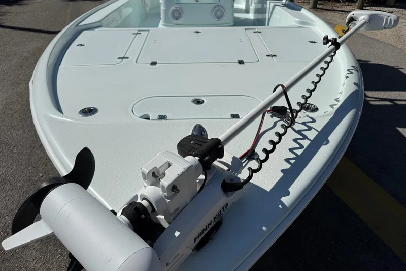 Slide: The Image of 2017 Yellowfin 24 Bay CE boat with trolling motor on deck. - 42