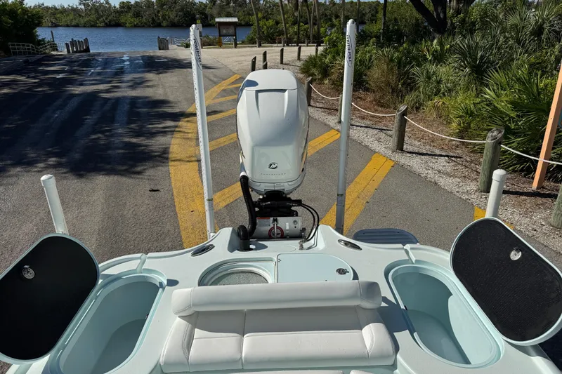 Slide: The Image of 2017 Yellowfin 24 Bay CE boat at a scenic lakeside launch ramp. - 6