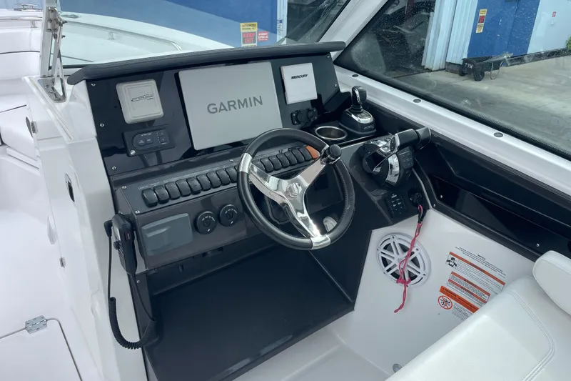 Slide: The Image of Control panel of 2022 Blackfin 272 DC boat with Garmin navigation system. - 8