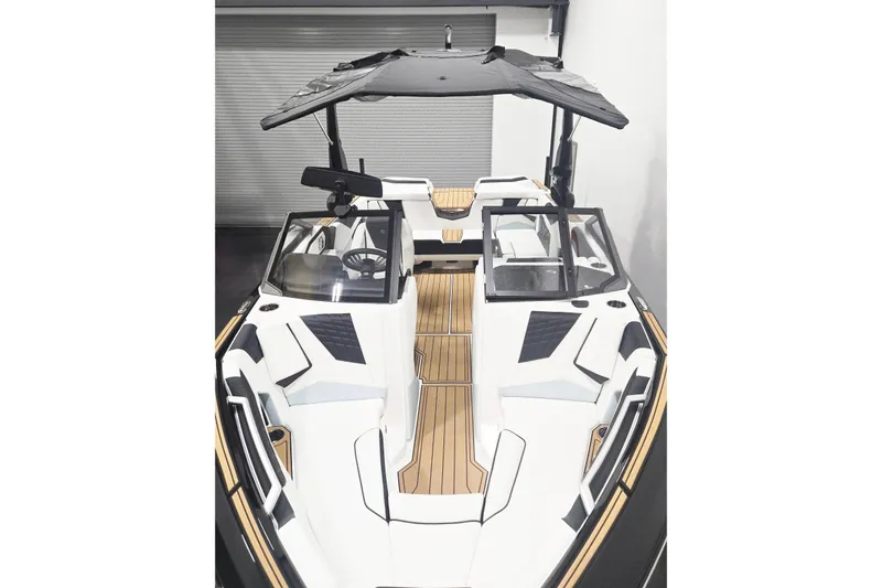 Slide: The Image of 2026 Nautique Super Air Nautique S21 boat interior with sleek design and modern features. - 7