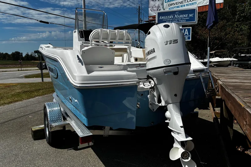 Slide: The Image of 2026 Robalo R180 Center Console boat with Yamaha 115 engine on trailer. - 4