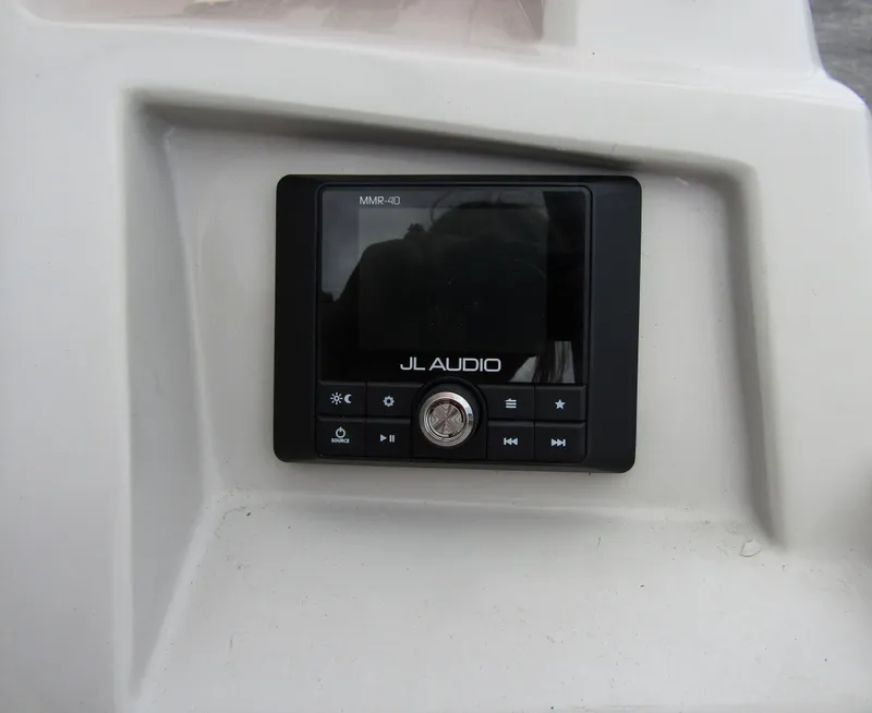 Slide: The Image of JL Audio system on 2024 Starcraft SVX 231 OB DH boat dashboard. - 25