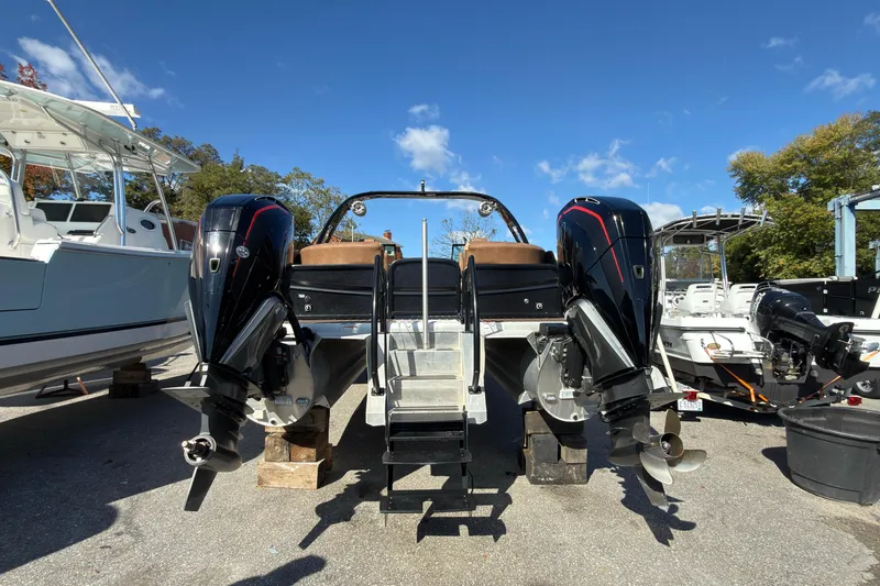 Slide: The Image of 2024 Premier Supersport boat with dual outboard motors on display. - 15