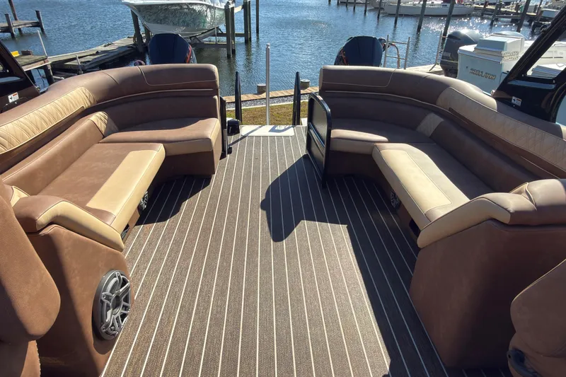Slide: The Image of Luxurious 2024 Premier Supersport boat interior with plush seating and waterfront view. - 9