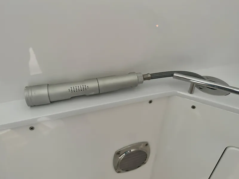 Slide: The Image of HCB Lujo 2025 boat shower head with hose on white surface. - 41