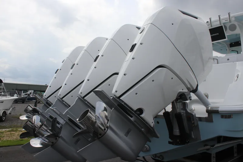 Slide: The Image of 2025 HCB Lujo boat with multiple powerful outboard engines. - 8