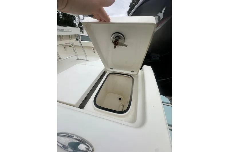 Slide: The Image of Open storage compartment on a 2023 Pathfinder 2005 TRS boat. - 20
