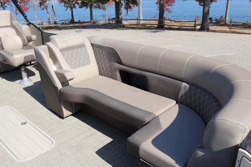Slide: The Image of Luxurious seating on 2023 Vanderbilt 700 Twin boat, with scenic lake view. - 3