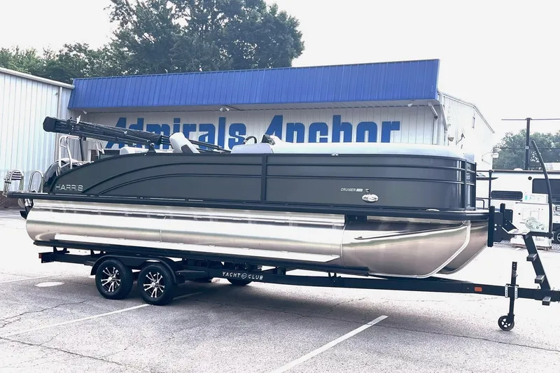 The Image of 2025 Harris Cruiser 230 pontoon boat on trailer at Admirals Anchor dealership. - 0