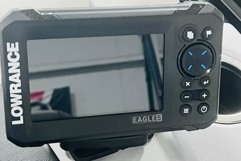 Slide: The Image of Lowrance Eagle 5 fishfinder on 2025 Harris Cruiser 230 boat dashboard. - 18