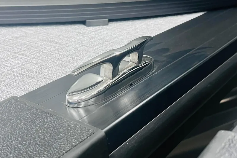 Slide: The Image of Stainless steel cleat on 2025 Harris Cruiser 230 boat deck. - 19