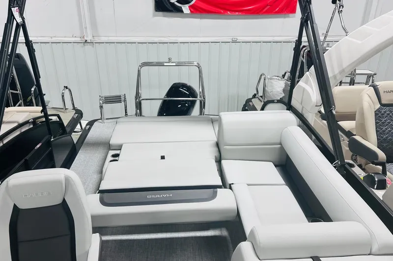 Slide: The Image of 2025 Harris Cruiser 230 interior with luxurious seating and modern design. - 29