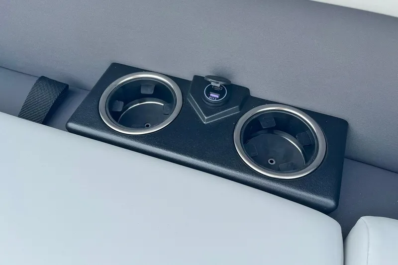 Slide: The Image of 2025 Harris Cruiser 230 boat cup holders with USB charging port. - 42