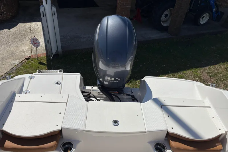 Slide: The Image of 2026 Robalo R180 Center Console boat with Yamaha outboard motor, viewed from above. - 12