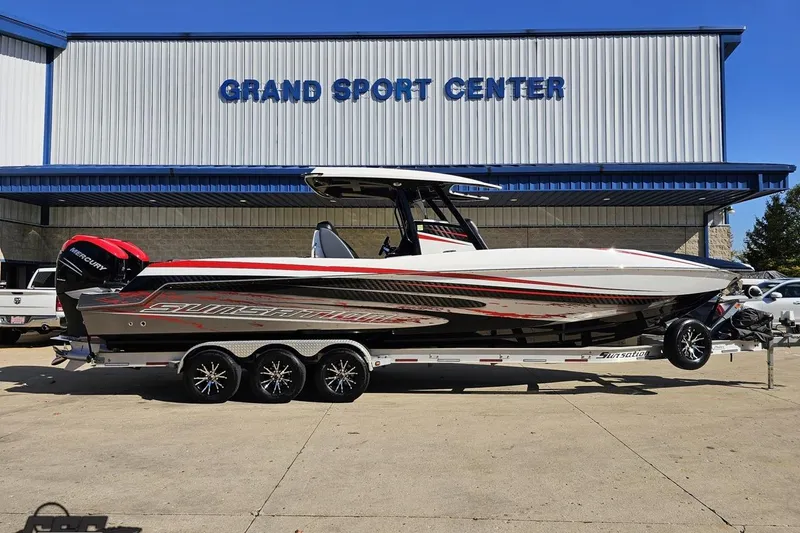 The Image of 2020 Sunsation 32 CCX boat on trailer at Grand Sport Center. - 1