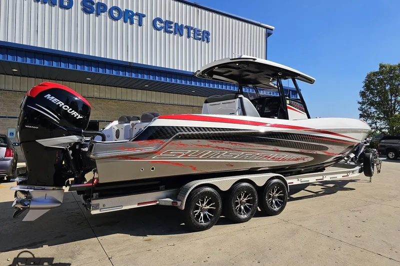 Slide: The Image of 2020 Sunsation 32 CCX boat with Mercury engine at a sport center. - 10