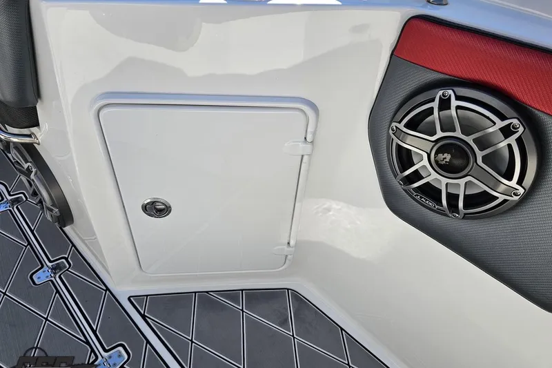 Slide: The Image of 2020 Sunsation 32 CCX boat interior with speaker and storage compartment. - 101
