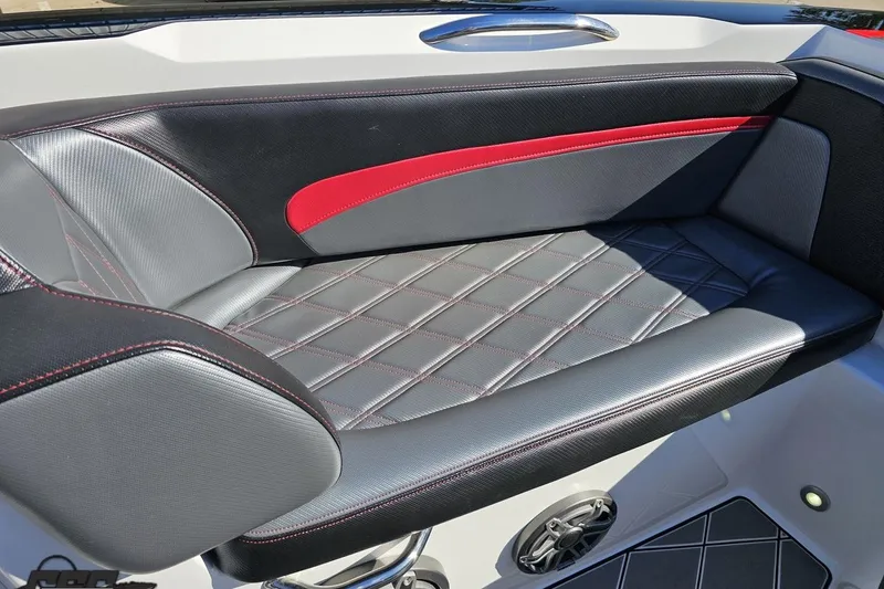 Slide: The Image of 2020 Sunsation 32 CCX boat interior with stylish black and red seating. - 104