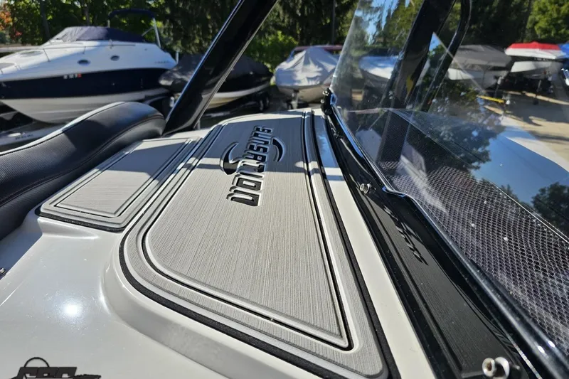 Slide: The Image of 2020 Sunsation 32 CCX boat dashboard with sleek design and logo detail. - 115