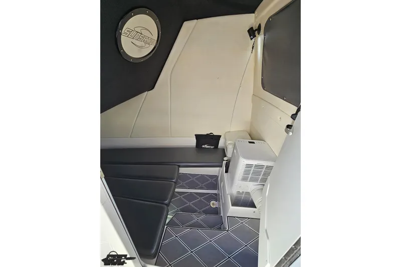 Slide: The Image of 2020 Sunsation 32 CCX cabin interior with seating and storage. - 117